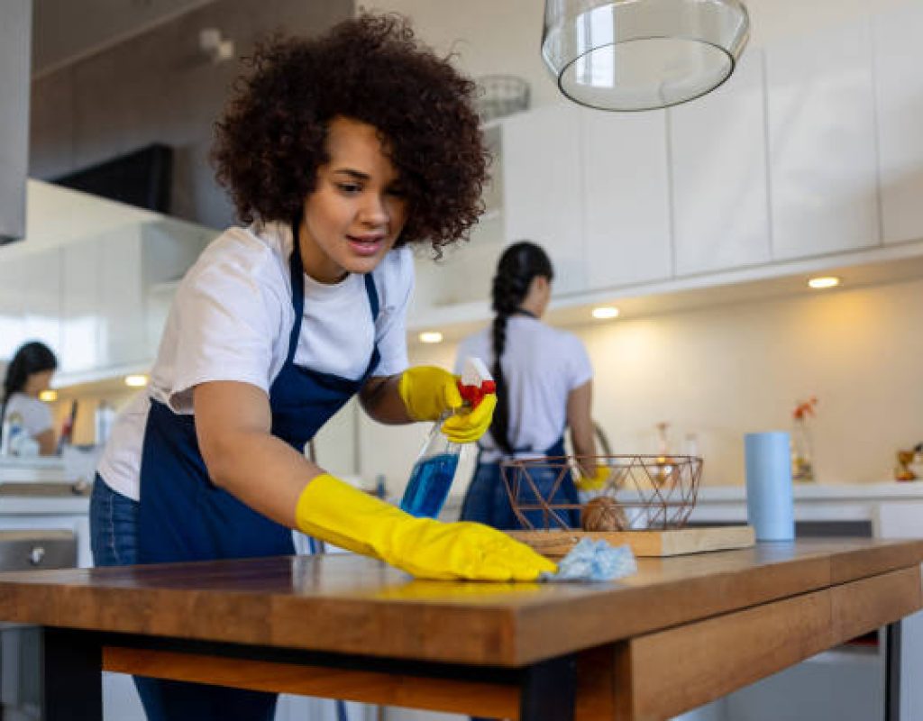 Efficient Klean team performing reliable house cleaning service in homes